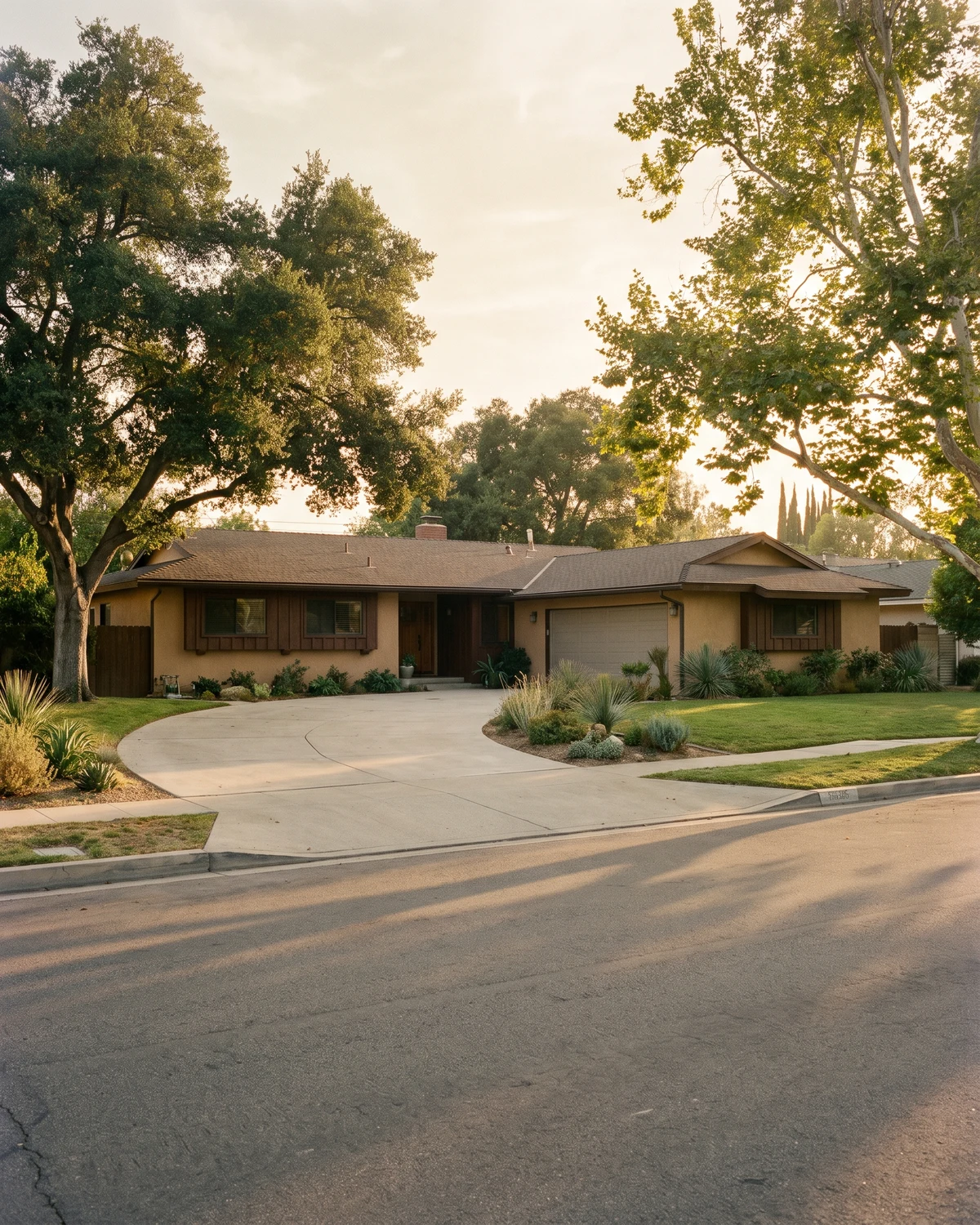 Single-story Northridge home on a broad tree-lined street